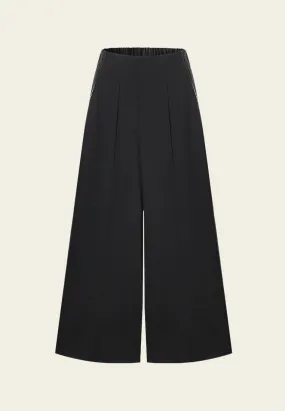 Wide-leg Flared Pleated-detail Faux Leather-trimmed Trousers